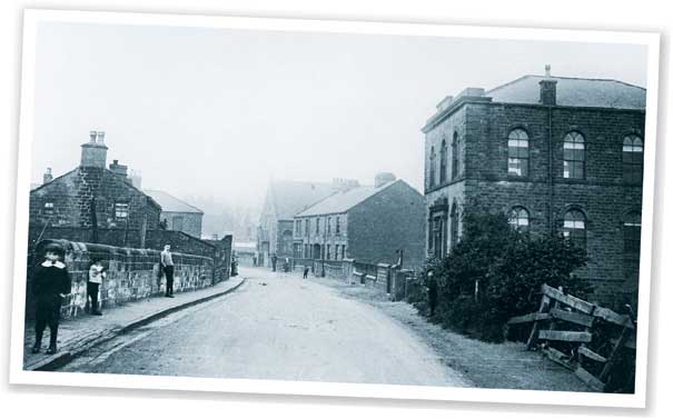 A view of the top of Spark Lane, Mapplewell, which was named after John Spark who in 1696 brought rod iron, used by nail makers, to the village from Rotherham and Wortley on pack mules.