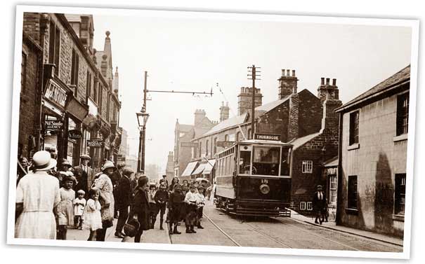 A Dearne Light Railway tram is pictured bound for Thurnscoe in High Street, Wombwell, probably in the late 1920s or early 30s.